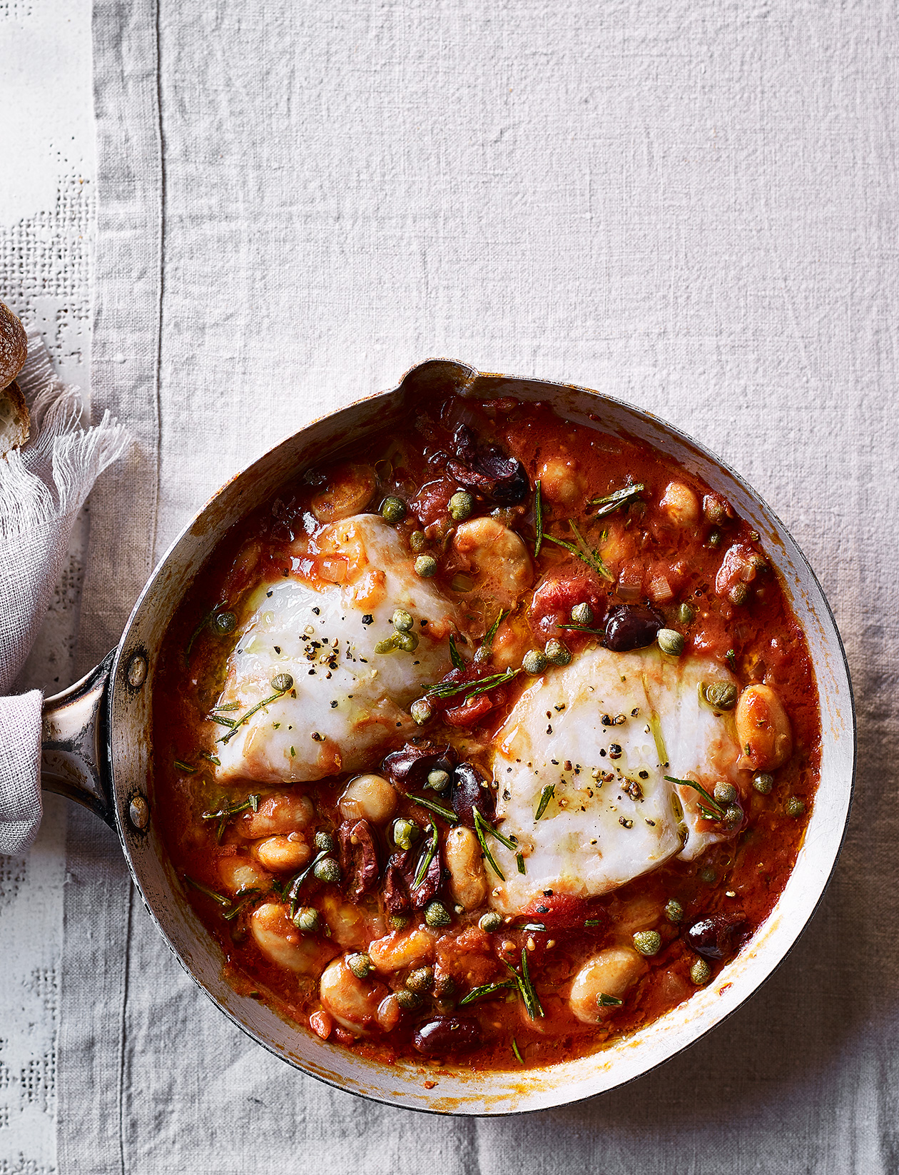 Cod Puttanesca With Spinach Spaghetti Puttanesca baked cod recipe | Sainsbury`s Magazine