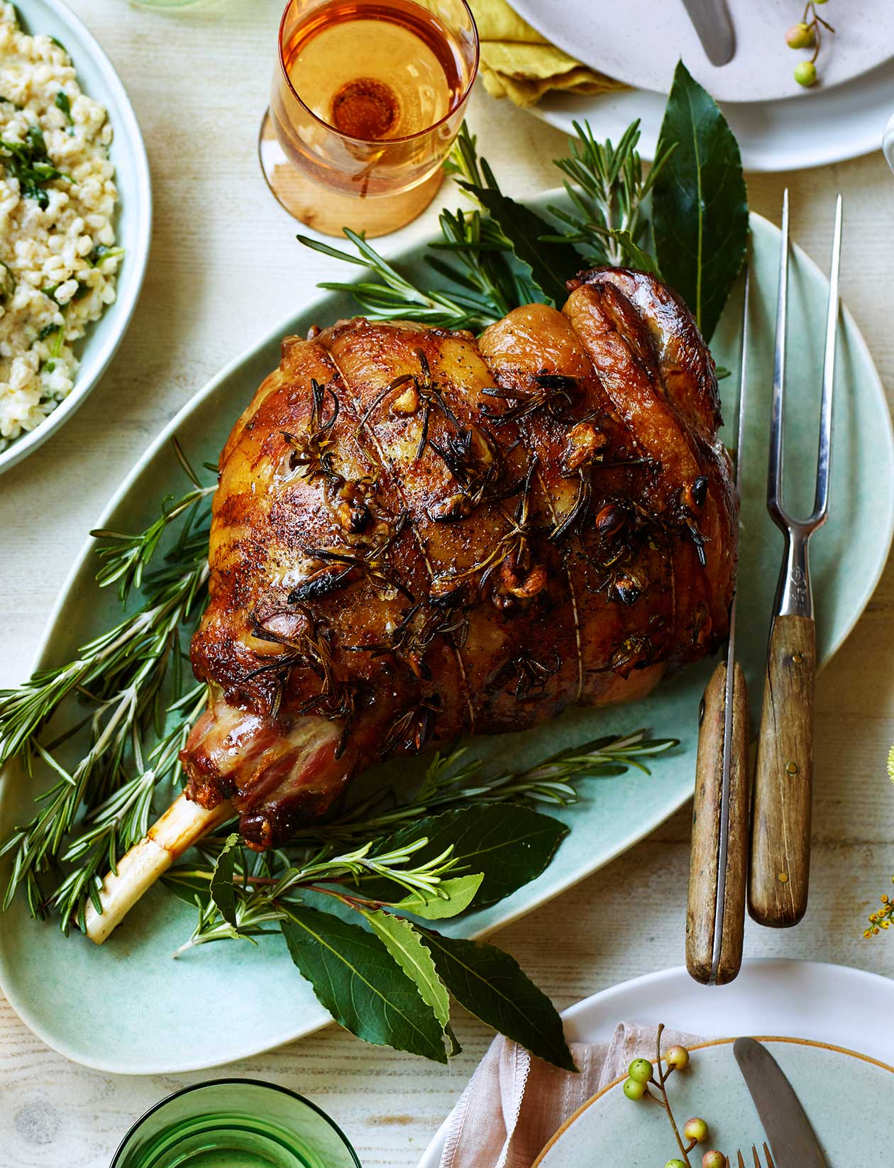 Roast leg of lamb with garlic and rosemary recipe | Sainsbury`s Magazine
