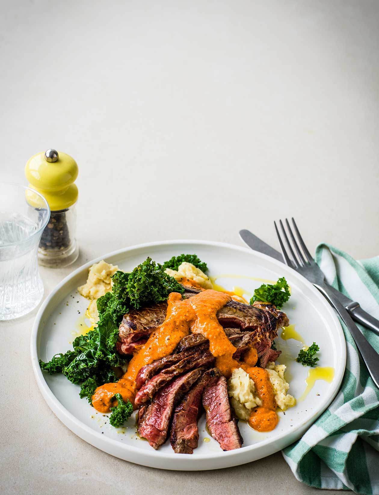 Steak with Romesco sauce and butterbean mash recipe | Sainsbury`s Magazine