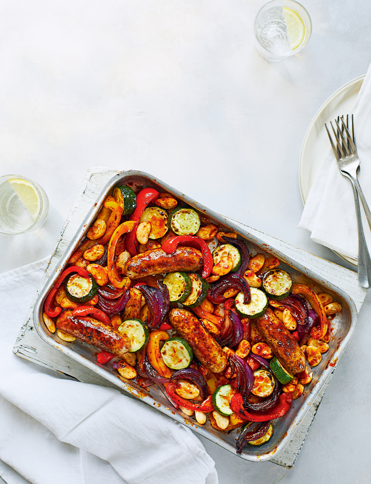 Summer sausage traybake recipe Sainsbury`s Magazine
