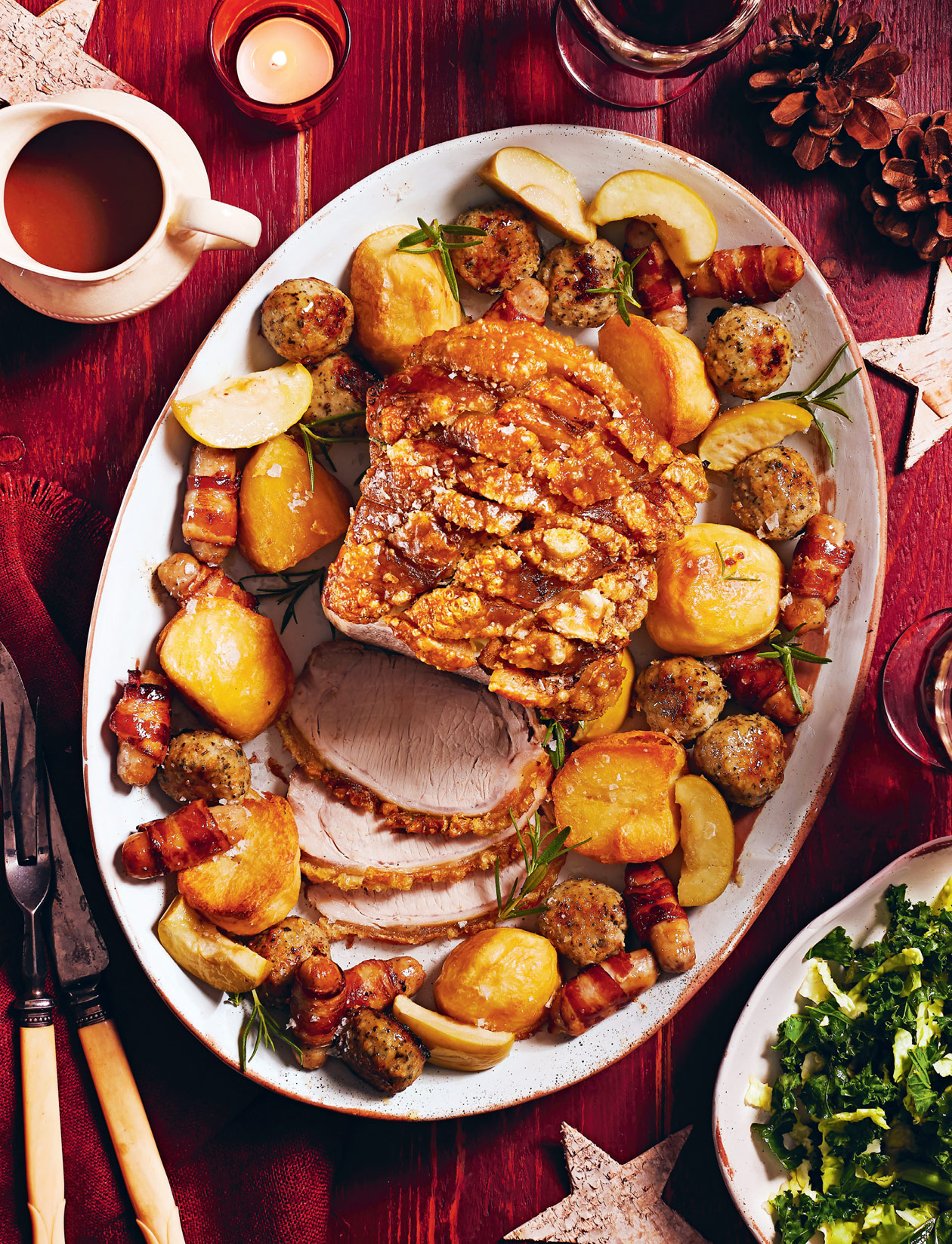 Sponsored Roast pork loin with cranberry glazed pigs in blankets