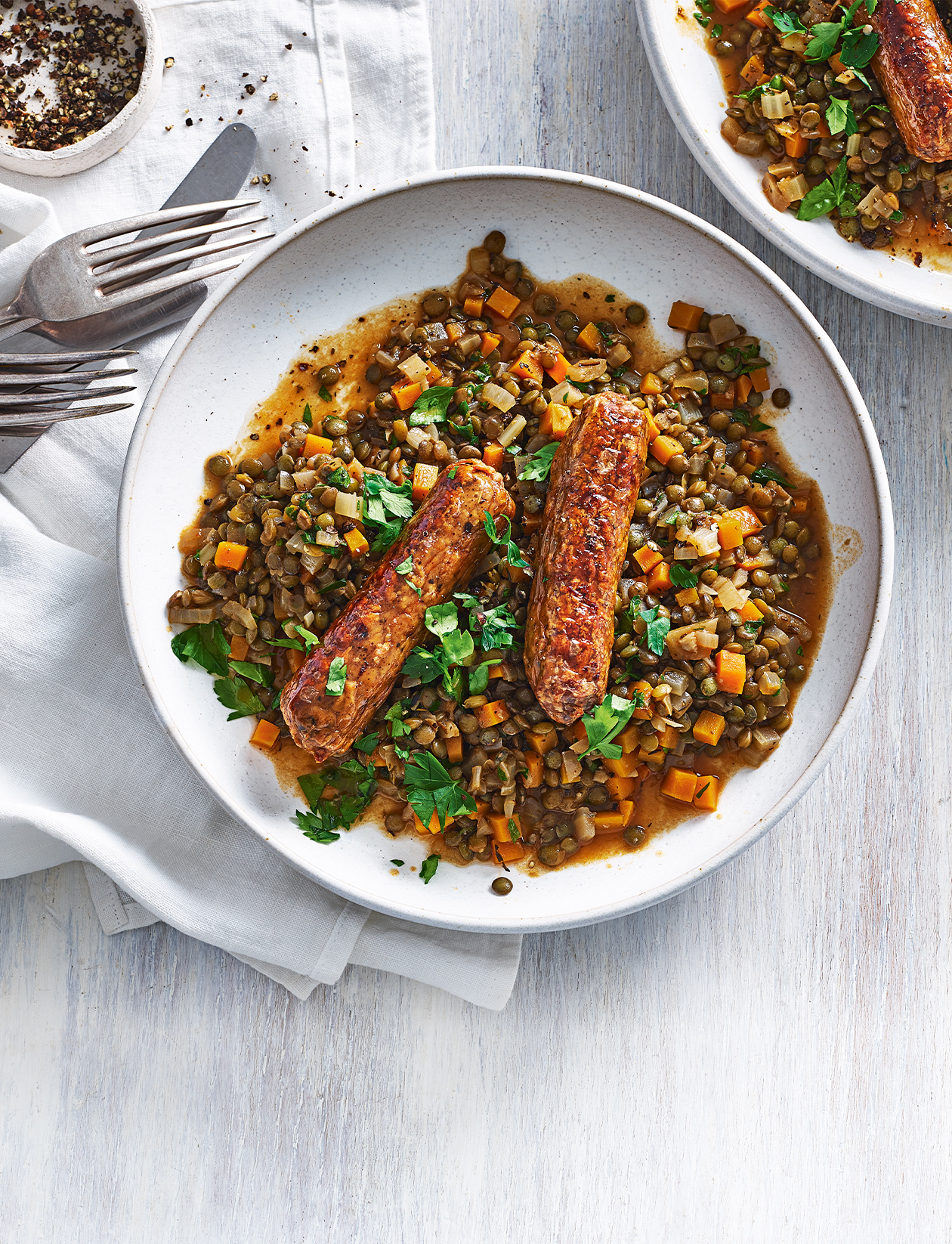 Sausages with lentil ragout recipe | Sainsbury`s Magazine