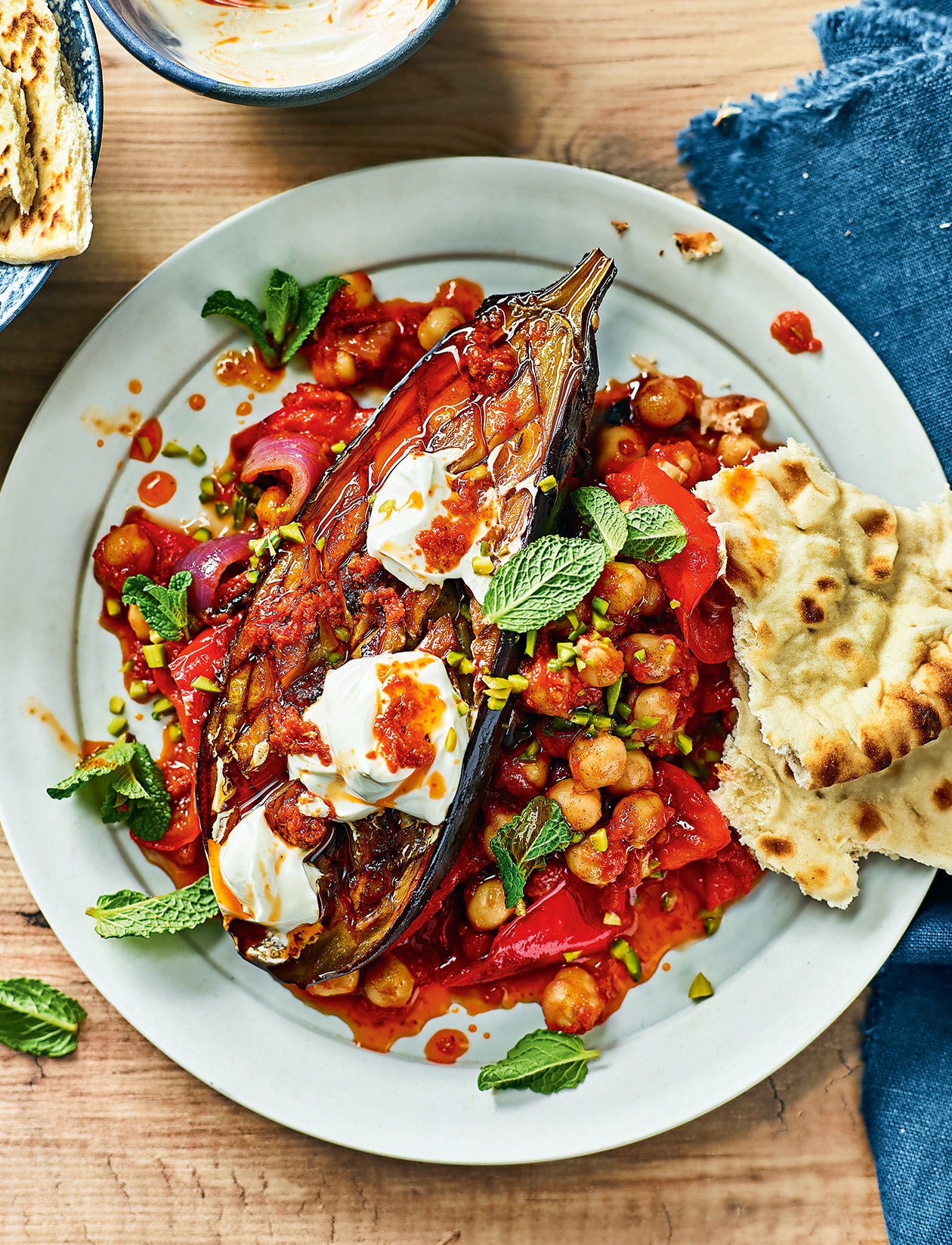 Roasted harissa aubergines with tomato, red pepper and chickpea stew ...