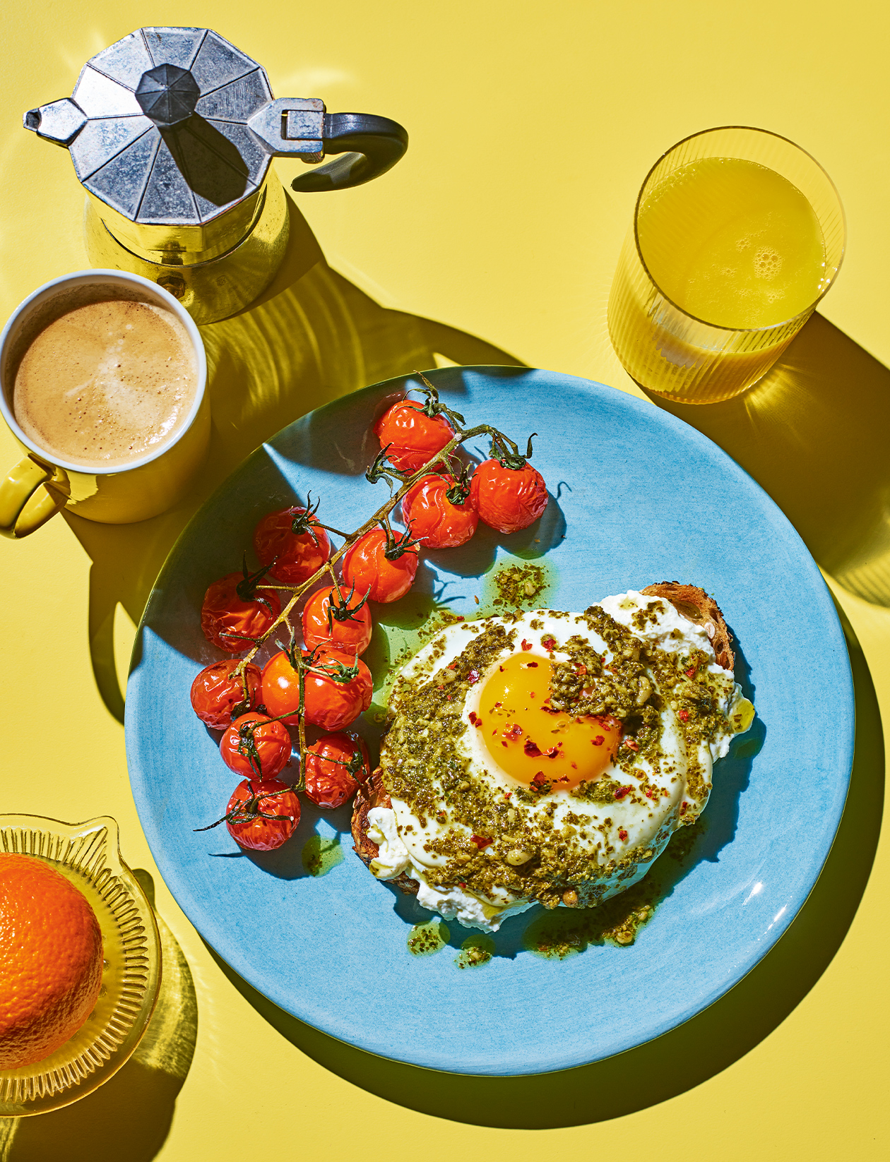 Pesto eggs on toast with tomatoes recipe | Sainsbury`s Magazine