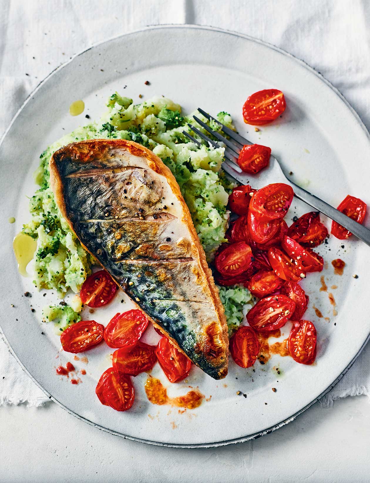 Mackerel and tomatoes with broccoli smash recipe Sainsbury`s Magazine