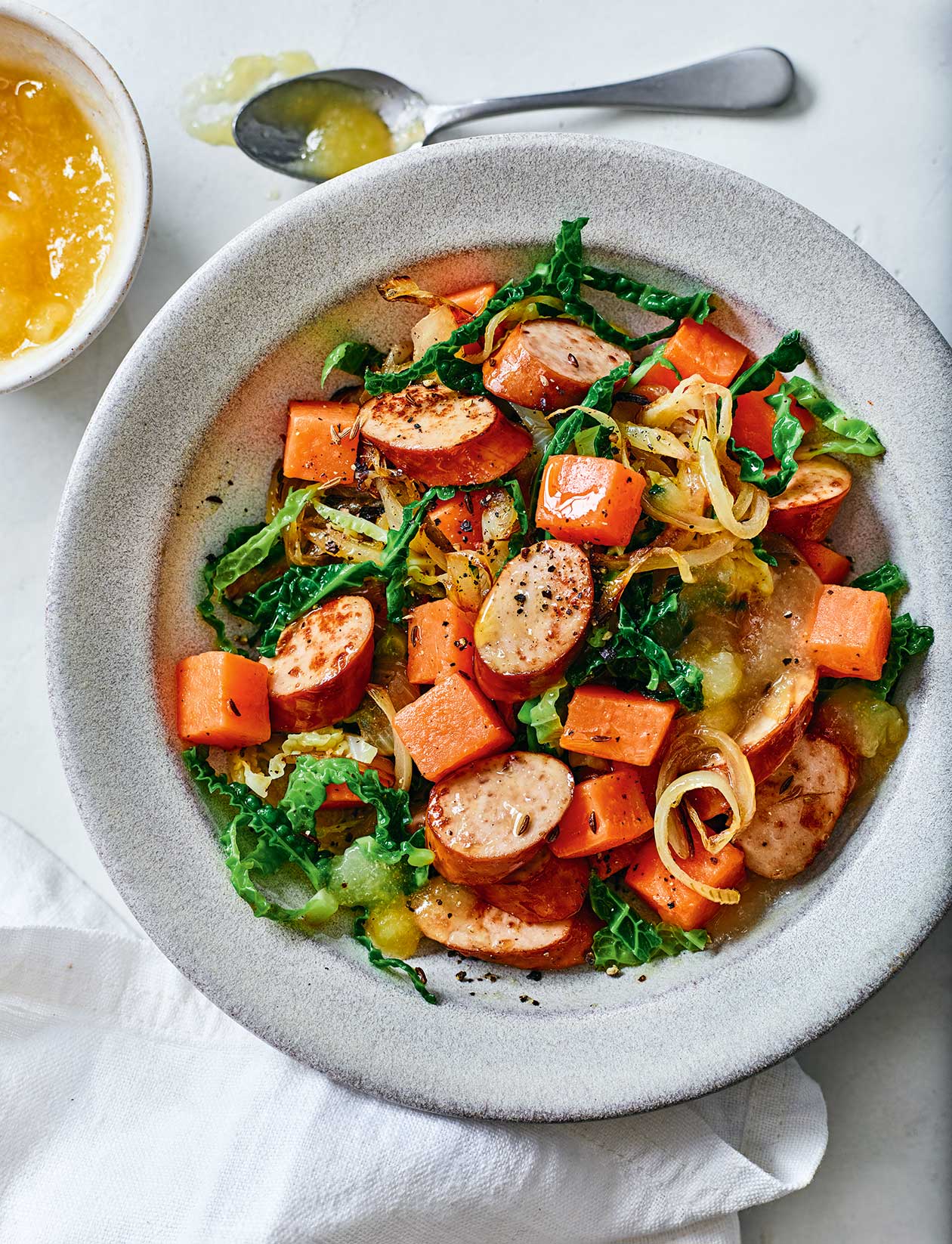 Smoked sausage and cabbage sauté recipe | Sainsbury`s Magazine