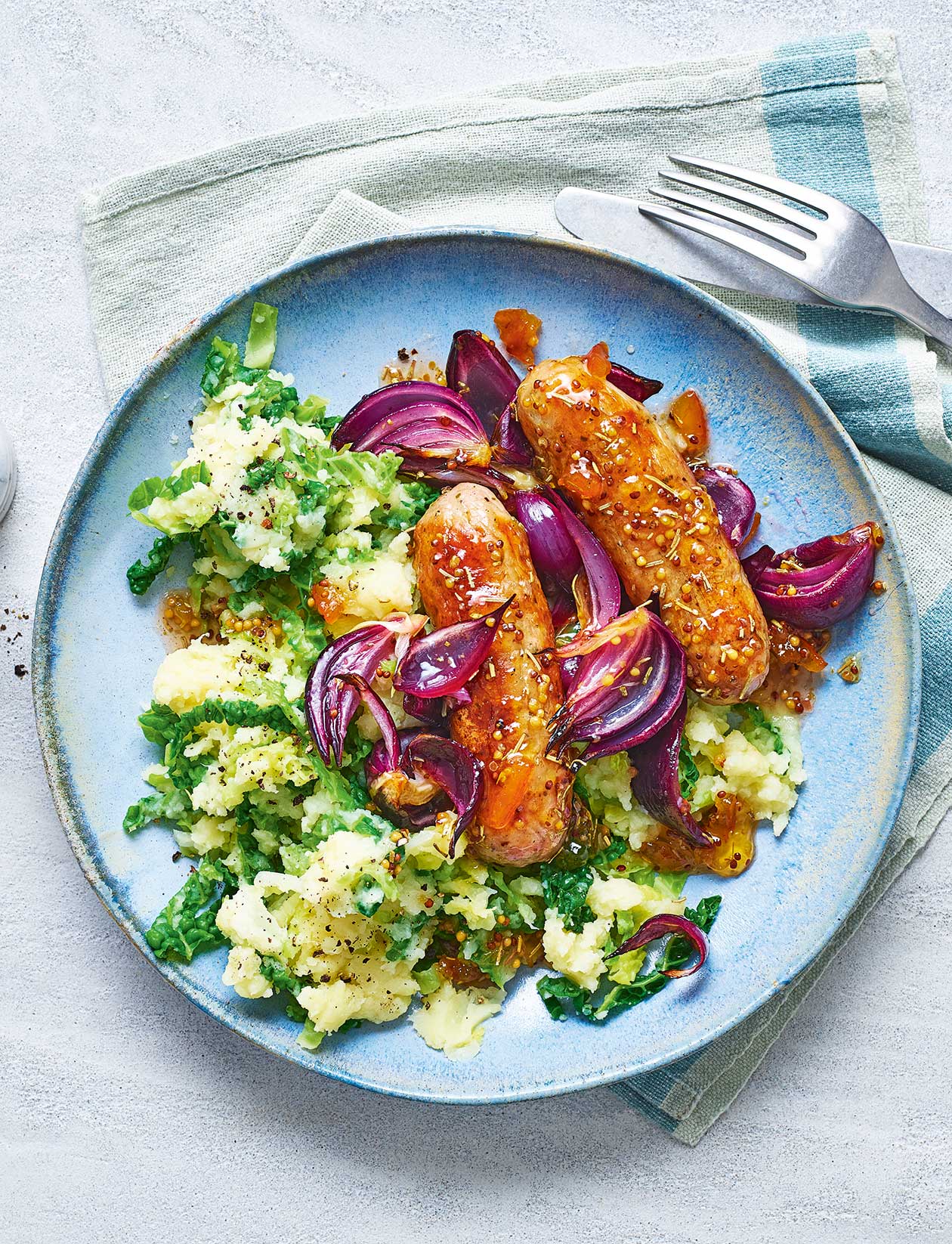 Marmalade sausages with parsnip colcannon recipe Sainsbury`s Magazine
