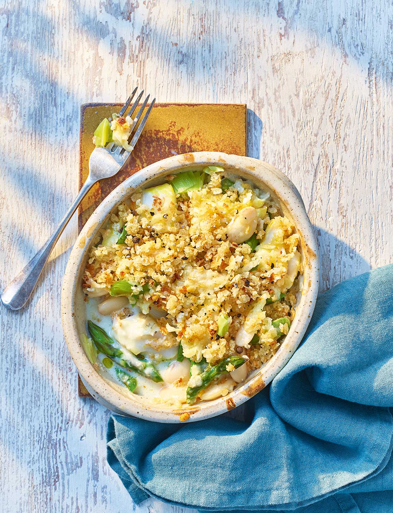 Smoked haddock, asparagus and bean gratin recipe | Sainsbury`s Magazine