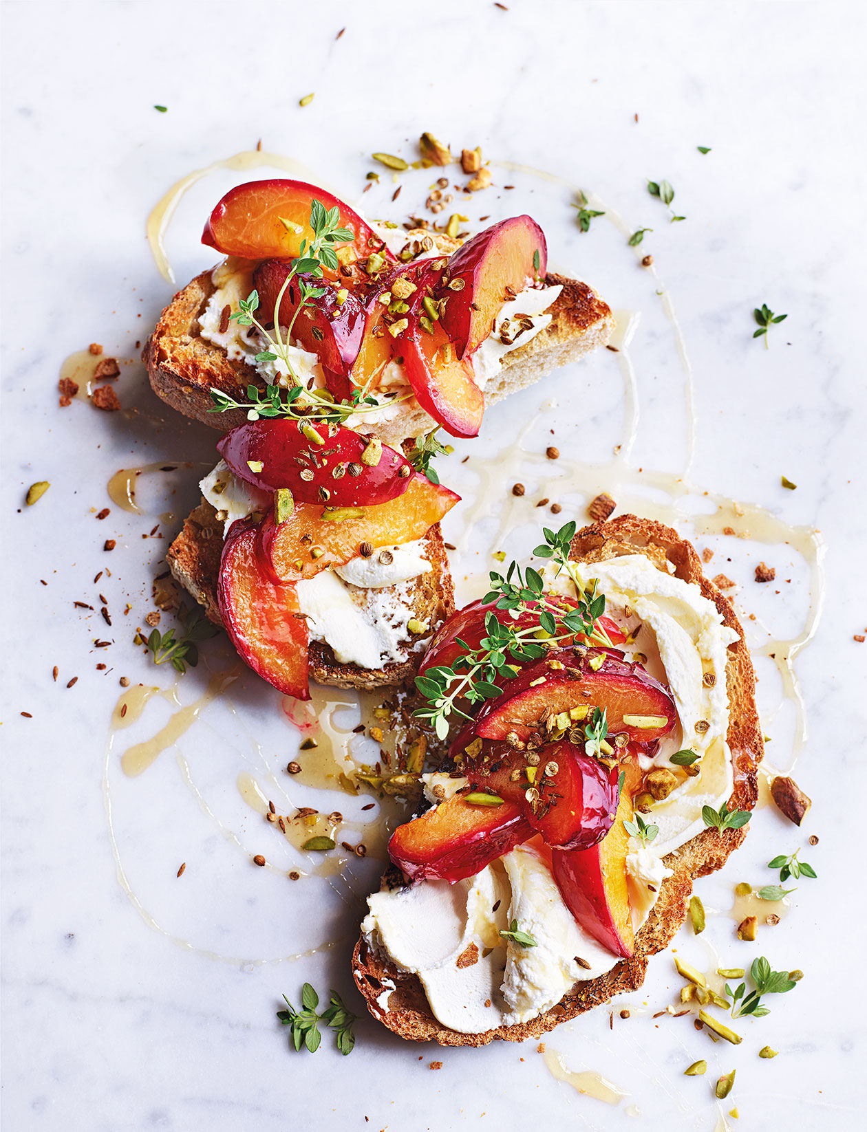 Creamy cheese toast with roast plums and pistachio dukkah recipe | Sainsbury`s Magazine