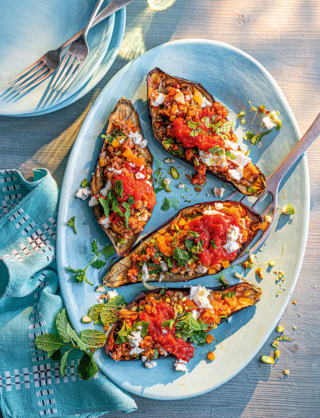 Spicy sausage-stuffed aubergines recipe | Sainsbury`s Magazine