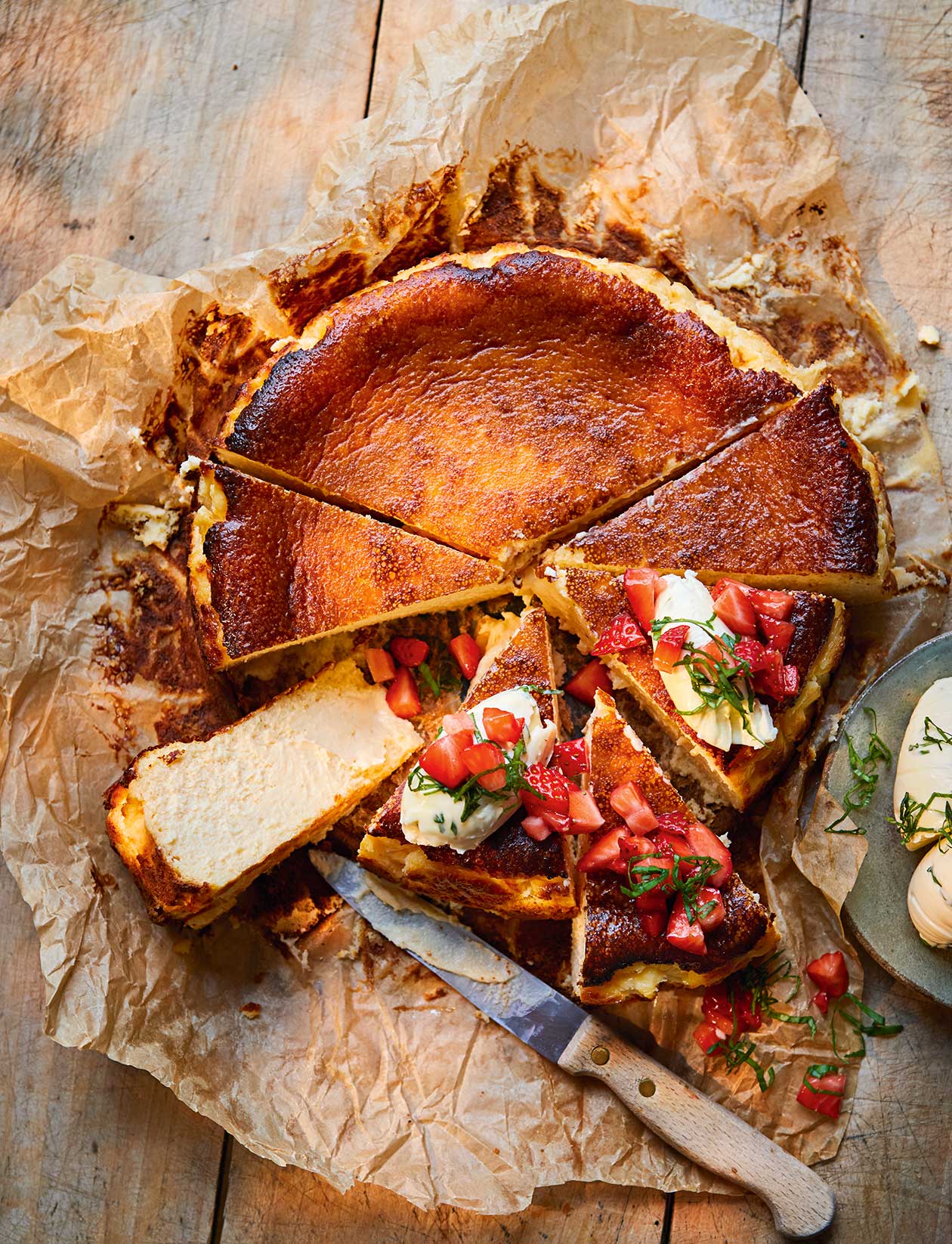 Burnt basque cheesecake with strawberries and basil cream recipe | Sainsbury`s Magazine