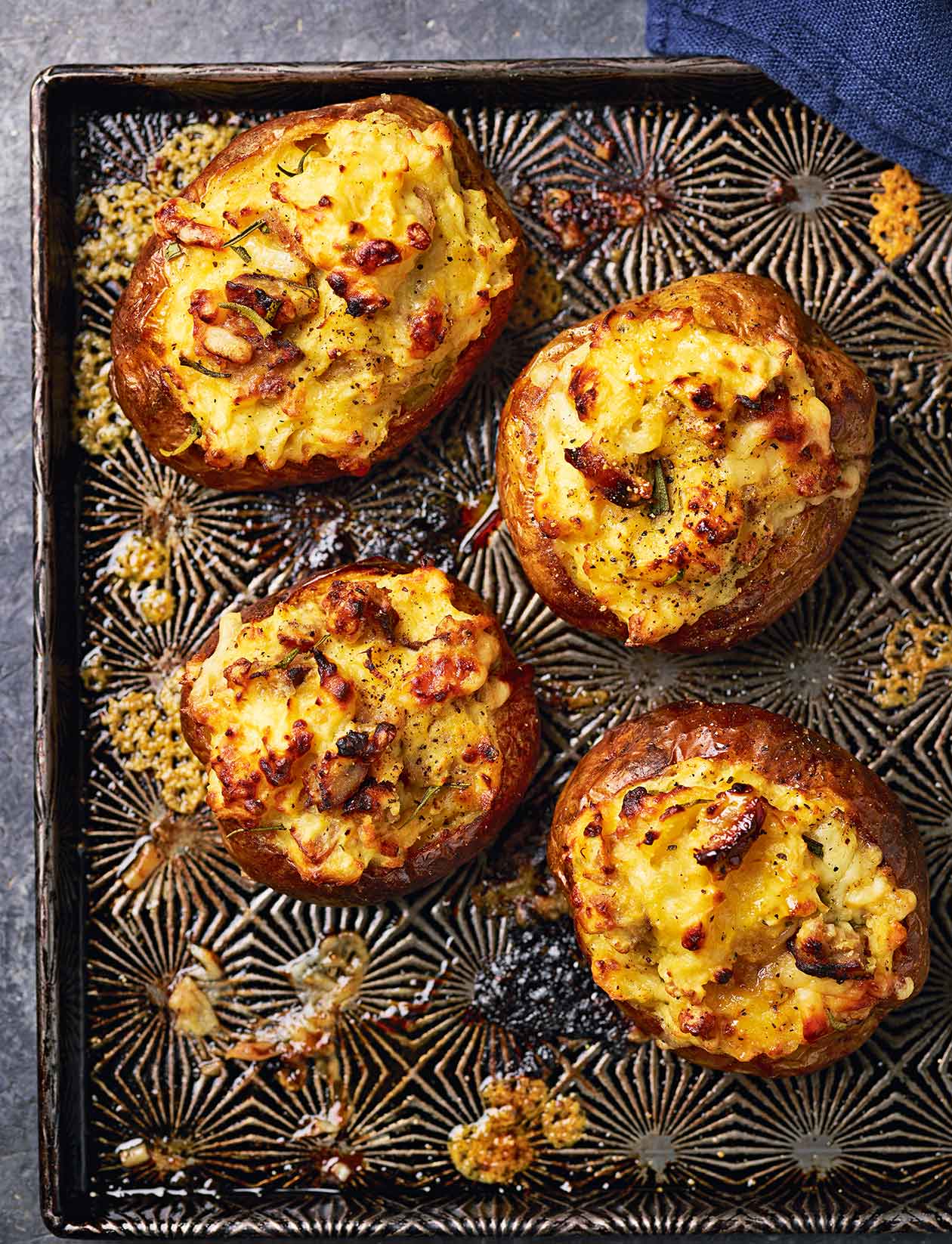 Sausage and mash jacket potatoes recipe | Sainsbury`s Magazine