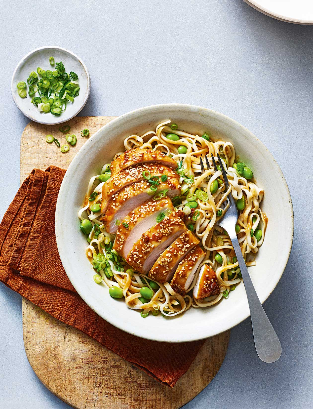 Tahini-soy chicken with edamame noodles recipe | Sainsbury`s Magazine