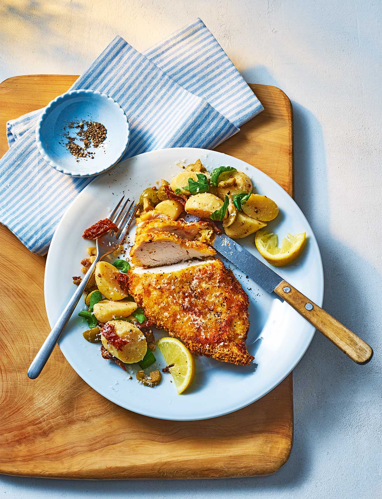 Air-fryer crispy chicken with antipasti potato salad recipe | Sainsbury`s Magazine
