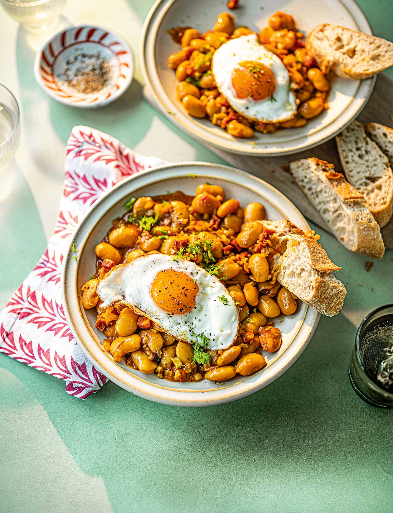 Saffron-braised butter beans with chorizo and fried eggs recipe | Sainsbury`s Magazine