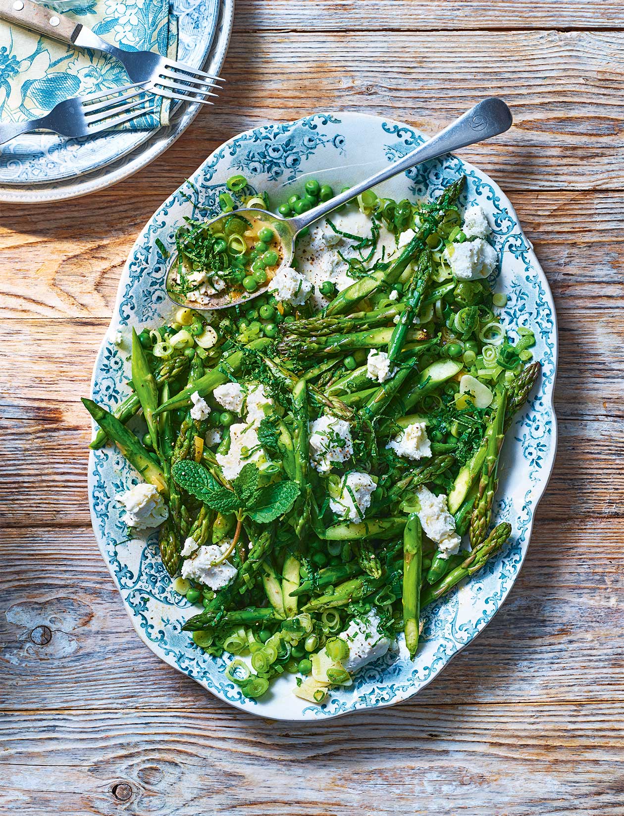 Asparagus and pea fricassee with goat's cheese recipe | Sainsbury`s Magazine