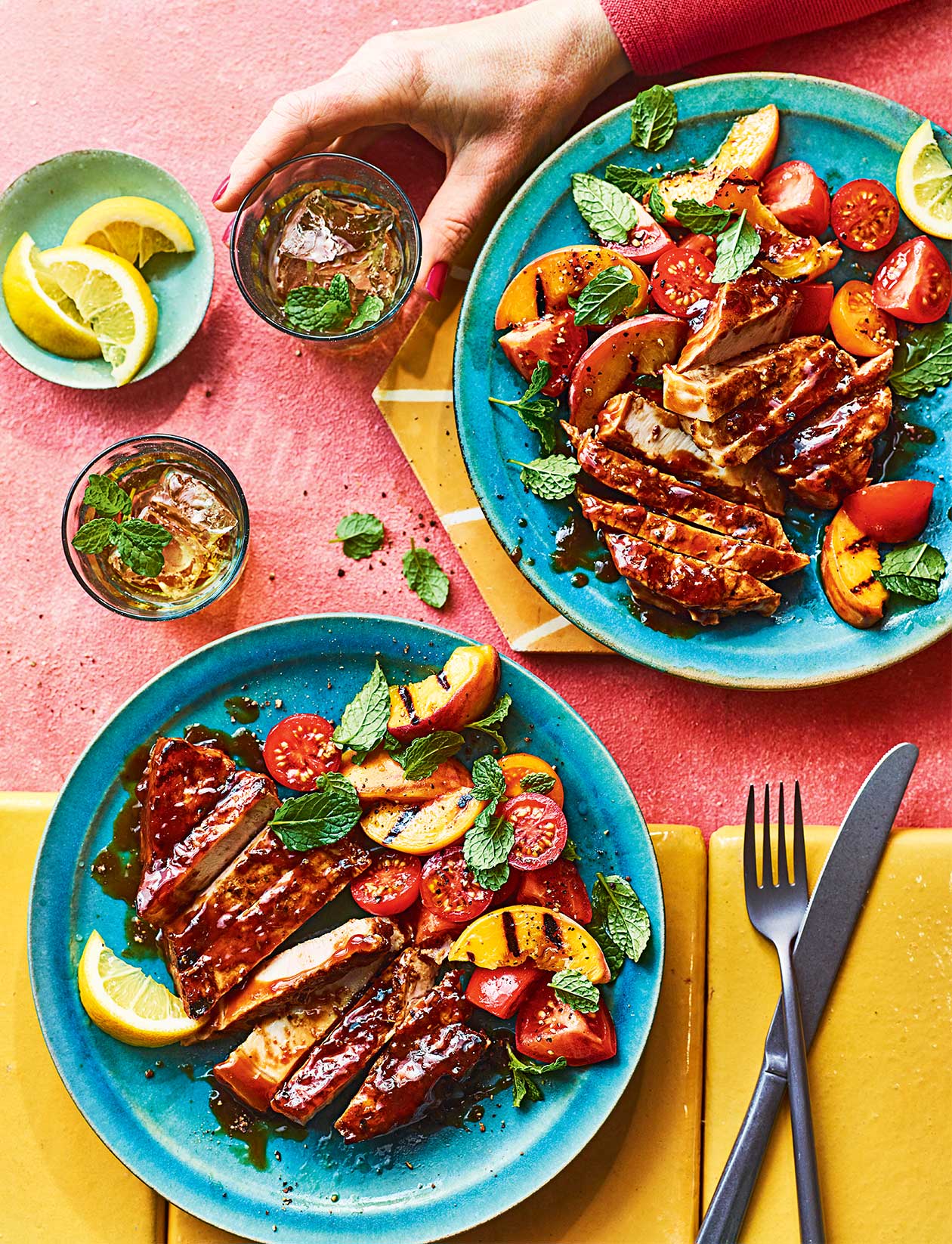 Bourbon-glazed pork chops with grilled peach and tomato salad recipe | Sainsbury`s Magazine