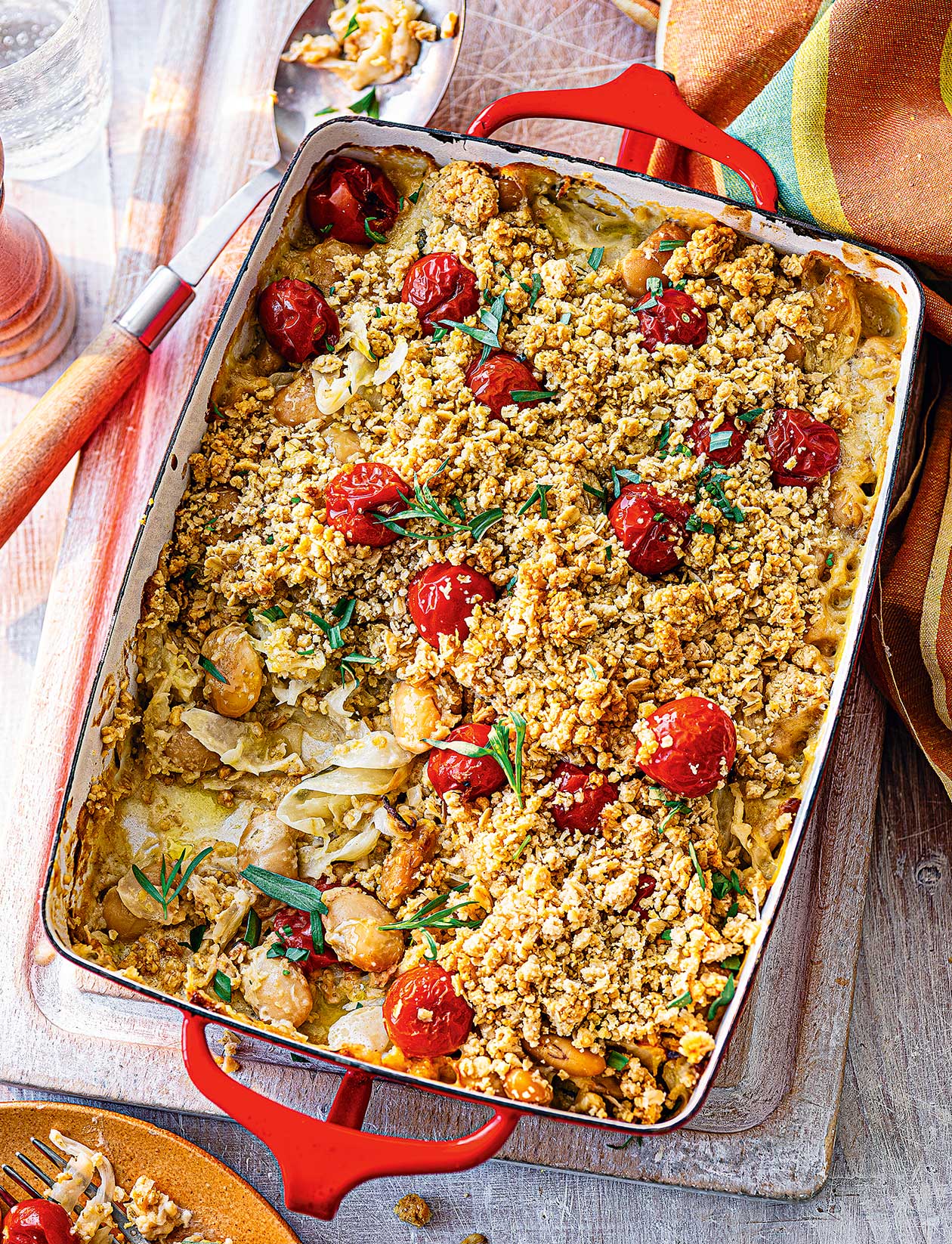 Oat crumble with fennel, butter beans and tomatoes recipe | Sainsbury`s Magazine