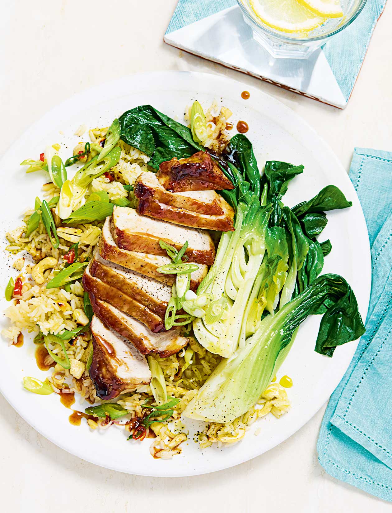 Sticky glazed pork with cashew and lemongrass rice recipe | Sainsbury`s Magazine