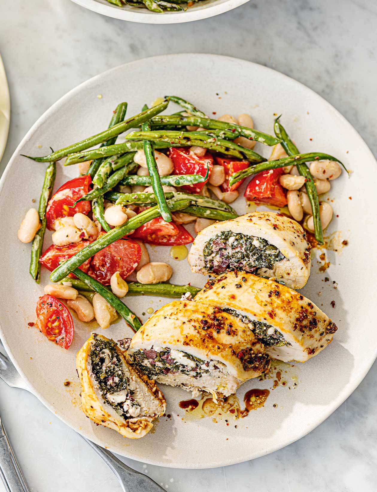 Spinach, cheese and olive stuffed chicken with two-bean salad recipe ...