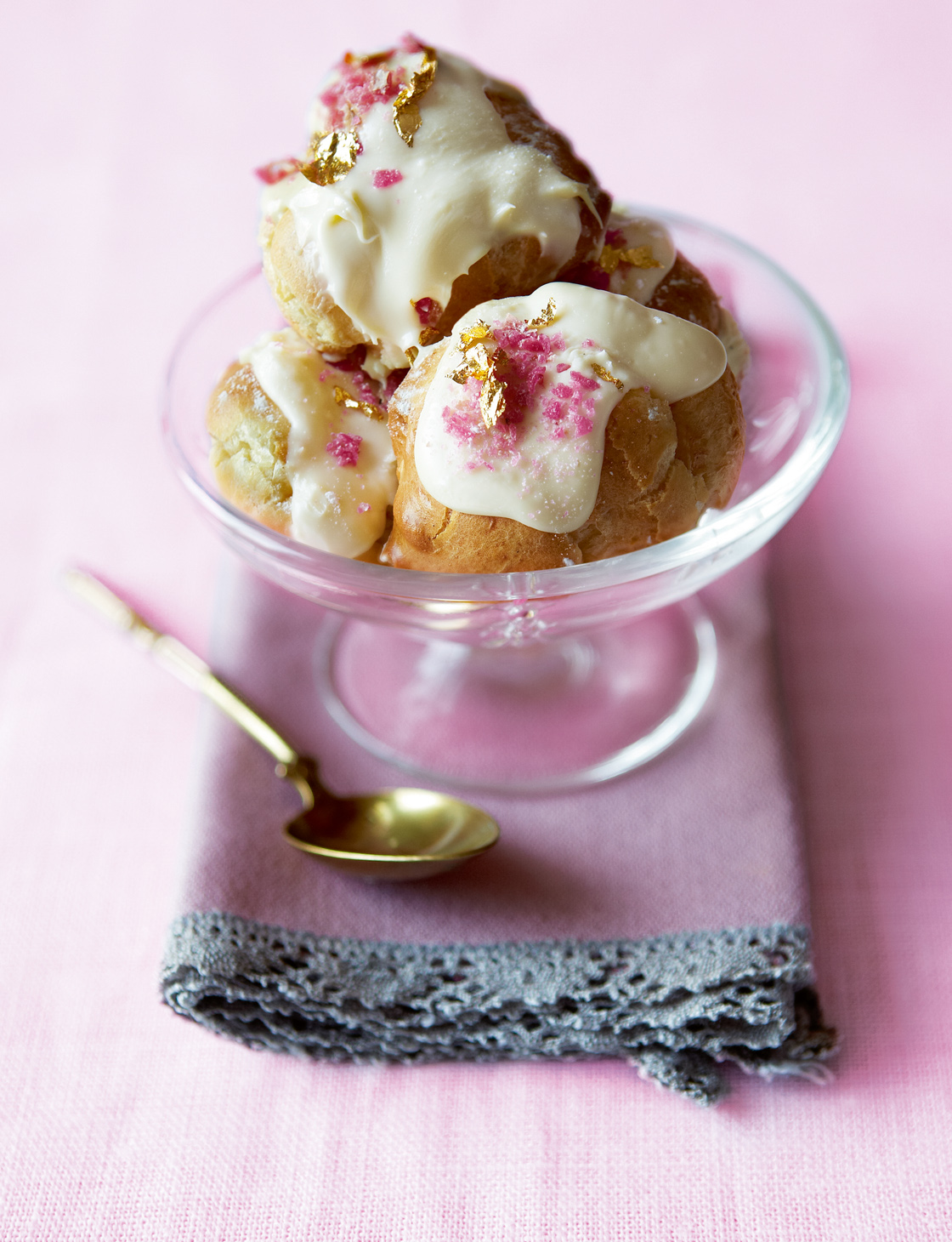 White chocolate and vanilla profiteroles with gold leaf and crystallised rose petals | Sainsbury`s Magazine