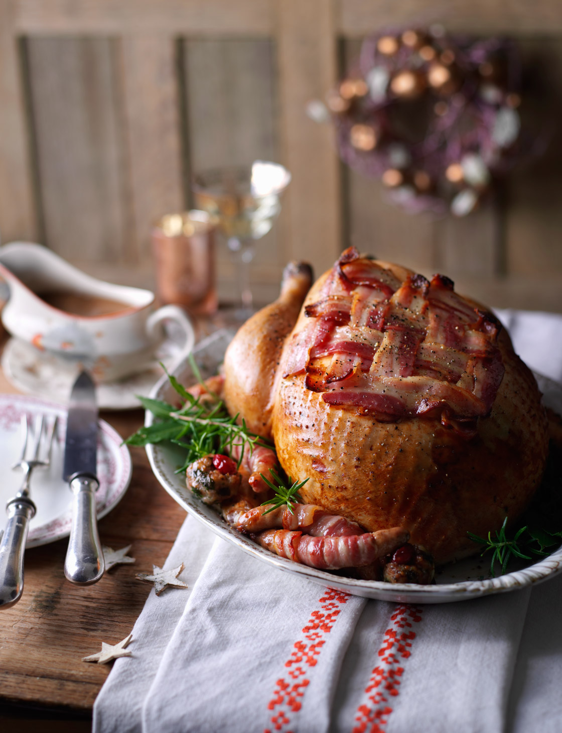 Roast turkey with cranberry stuffing and pigs in blankets
