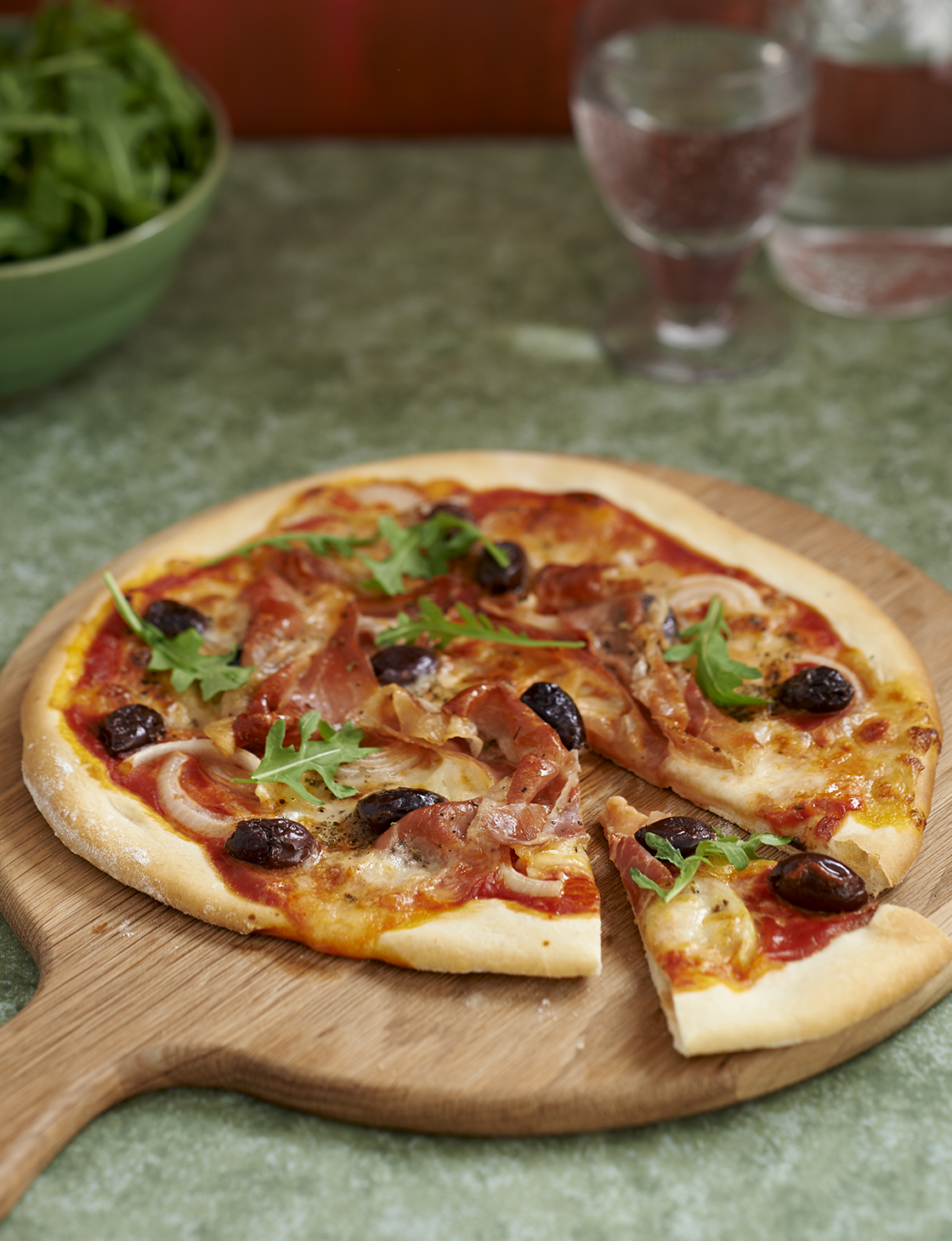 Prosciutto, olive and onion pizza | Sainsbury`s Magazine