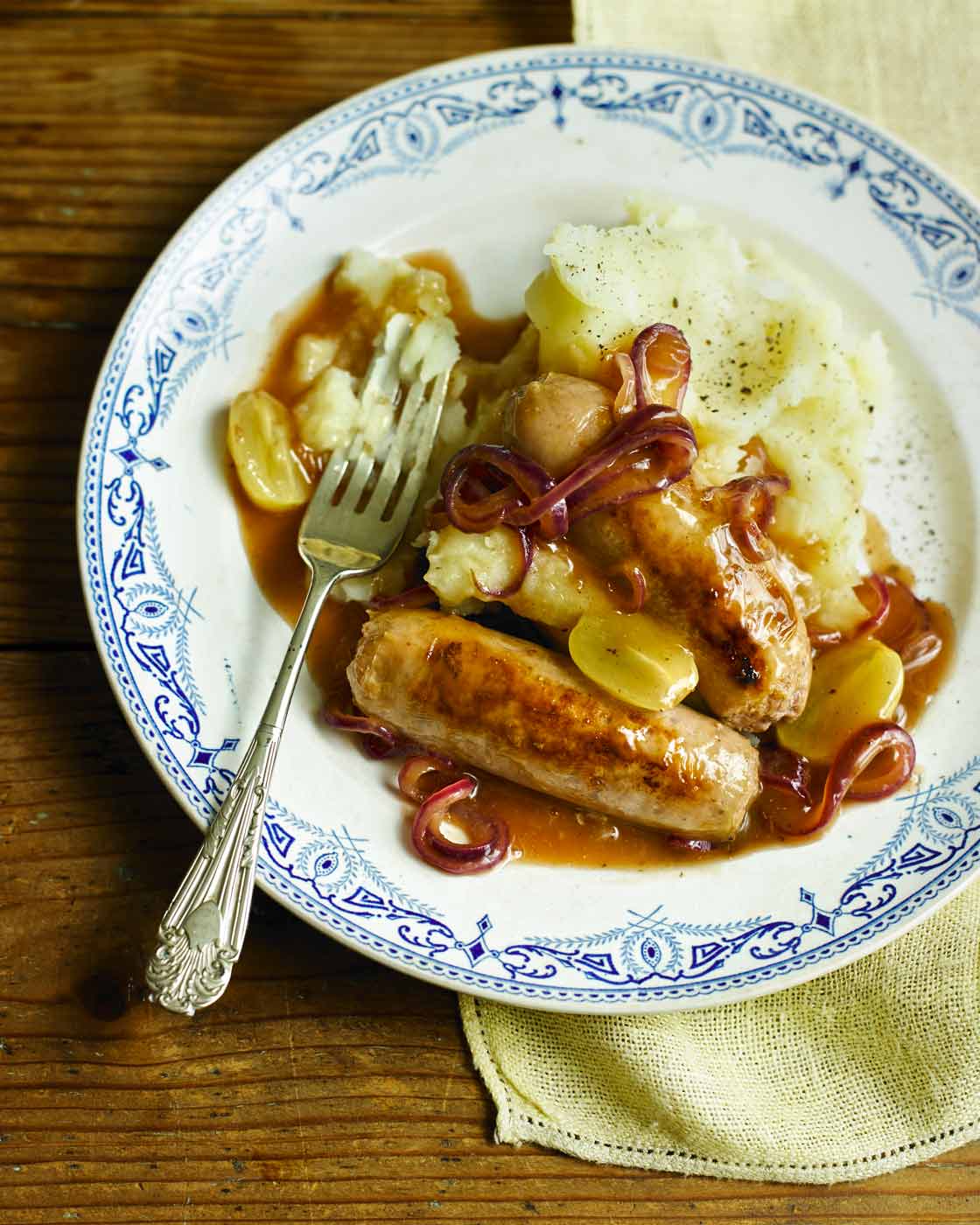 Vineyard sausages and celeriac mash | Sainsbury`s Magazine