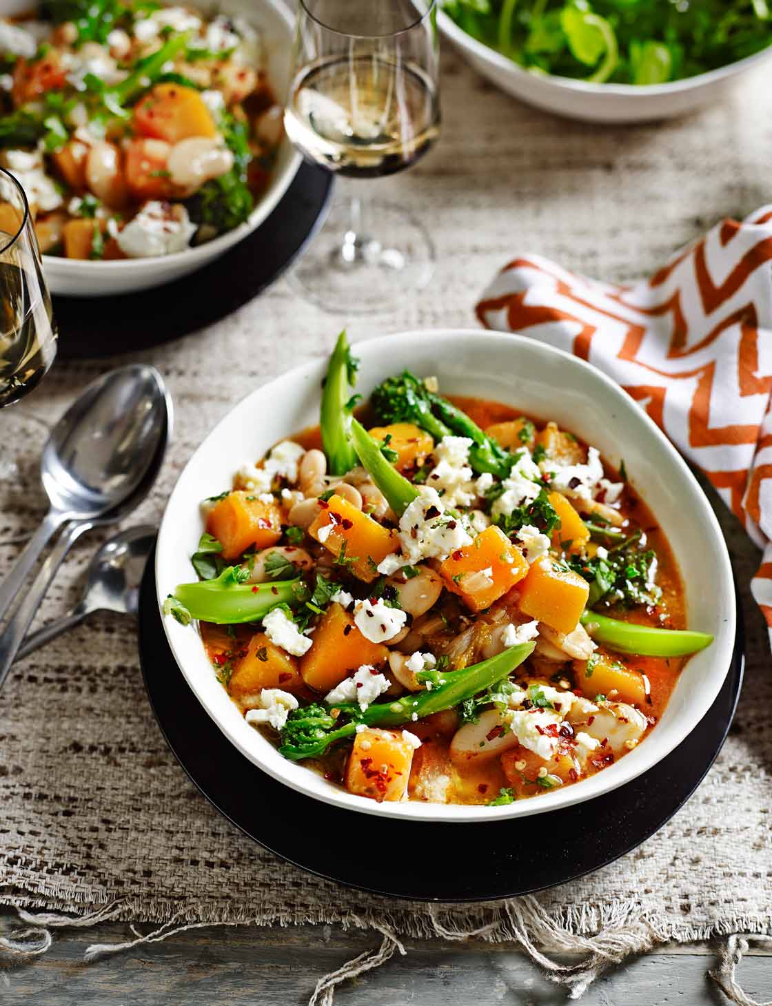 Spiced squash, butter bean and purple sprouting broccoli stew
