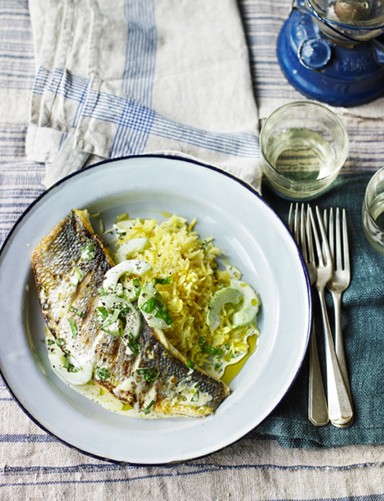 Grilled sea bass with cucumber and basil sauce and saffron pilaf