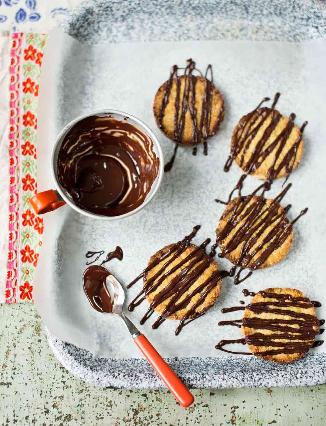 Apricot and almond bumbles with dark chocolate drizzle | Sainsbury`s Magazine