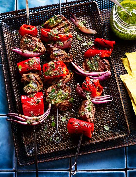 Smoky steak and red pepper kebabs with herby drizzle | Sainsbury`s Magazine