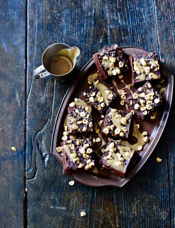 Milk chocolate and hazelnut squares with honey drizzle | Sainsbury`s Magazine