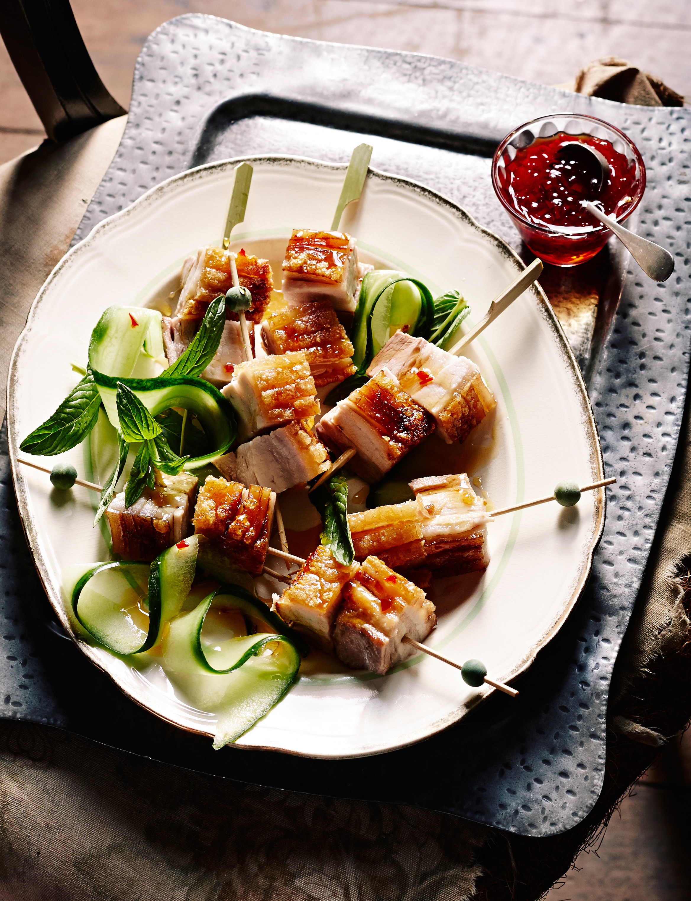 Crispy pork belly skewers with chilli garlic caramel