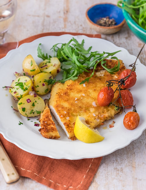 Chicken Parmesan with rocket and new potato salad | Sainsbury`s Magazine