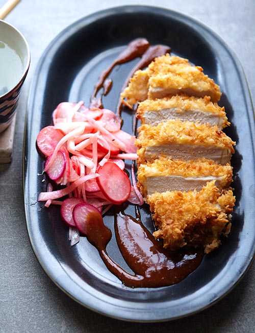 Tonkatsu crumbed pork with radish salad | Sainsbury`s Magazine