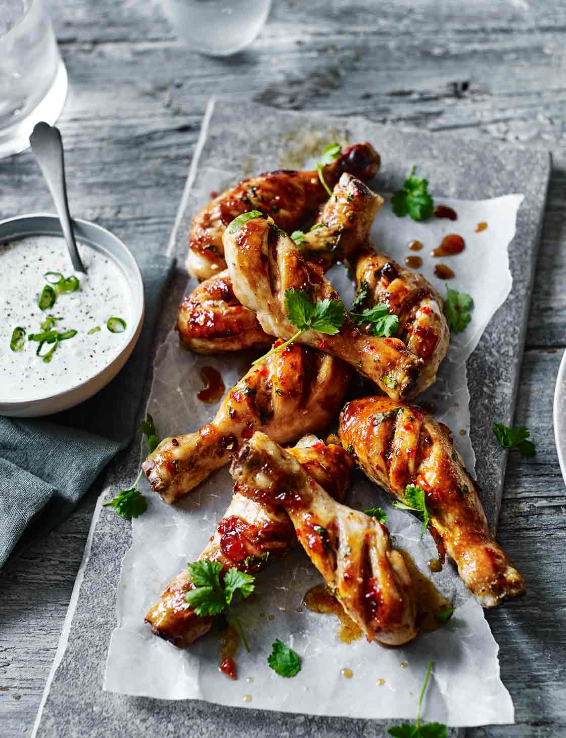 Sticky spiced chicken drumsticks recipe Sainsbury's Magazine
