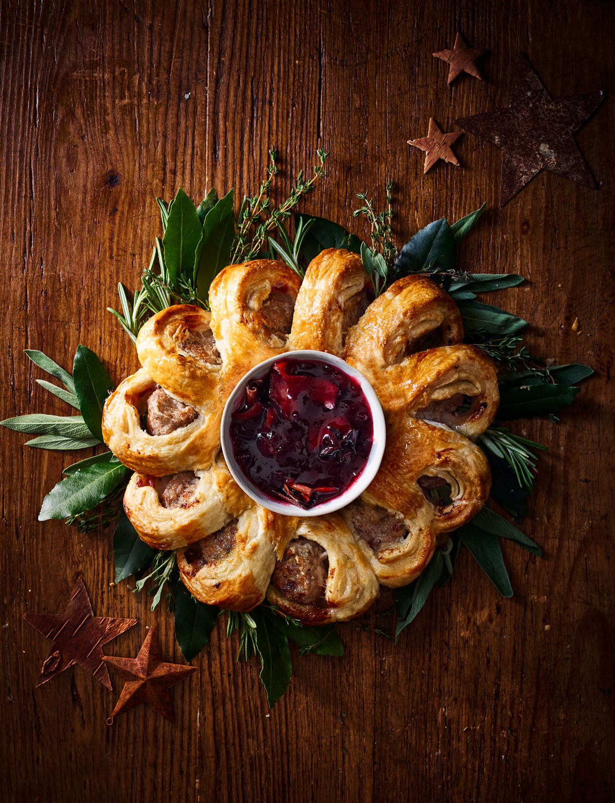 Sausage roll wreath with mulled wine cranberry relish 