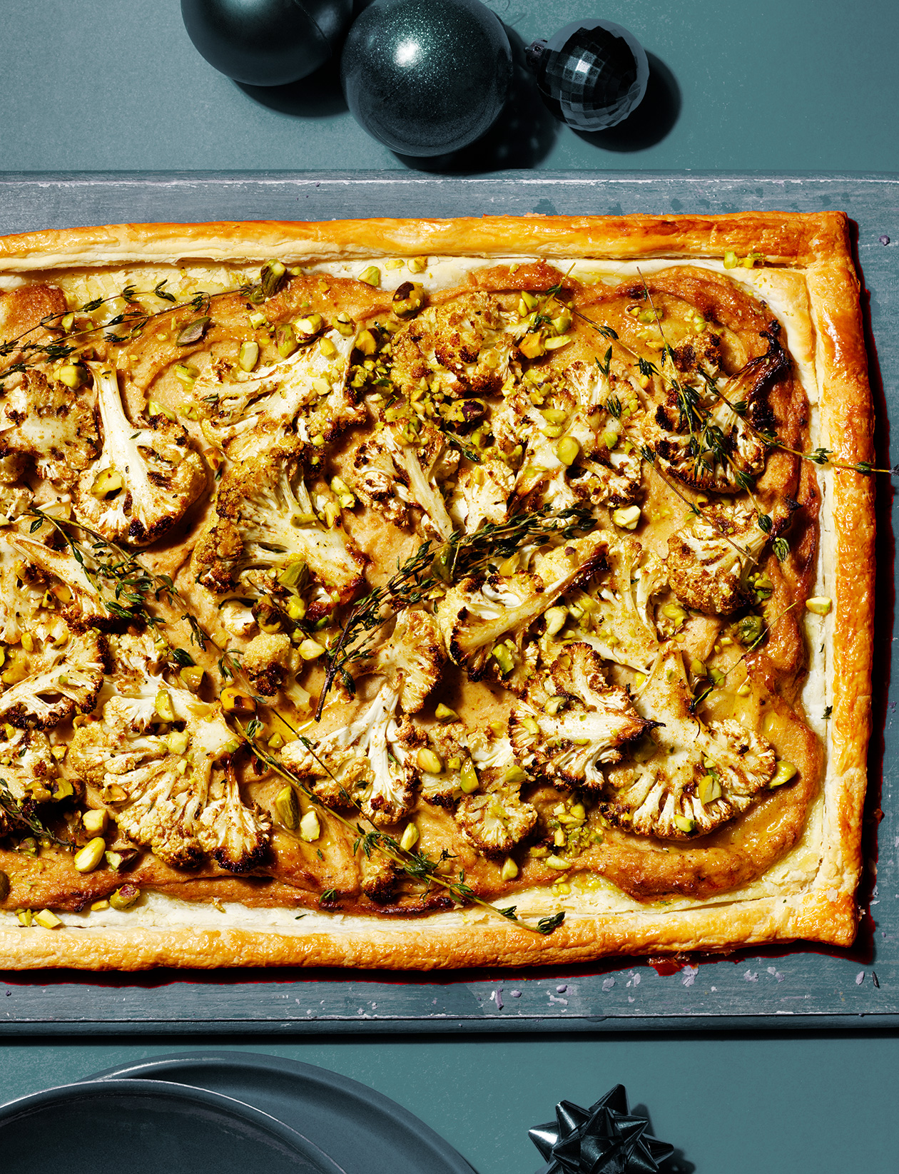 Spiced cauliflower tart with thyme and pistachios recipe Sainsbury`s
