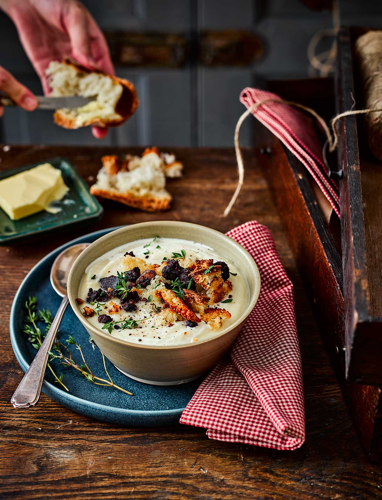 Mapleroasted celeriac and parsnip soup with black pudding crumbs