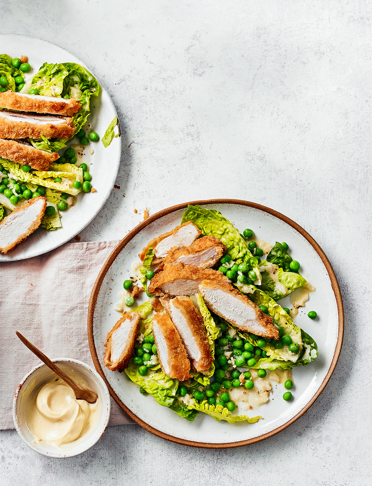 Chicken schnitzel salad with cheat’s garlic aioli recipe | Sainsbury`s Magazine