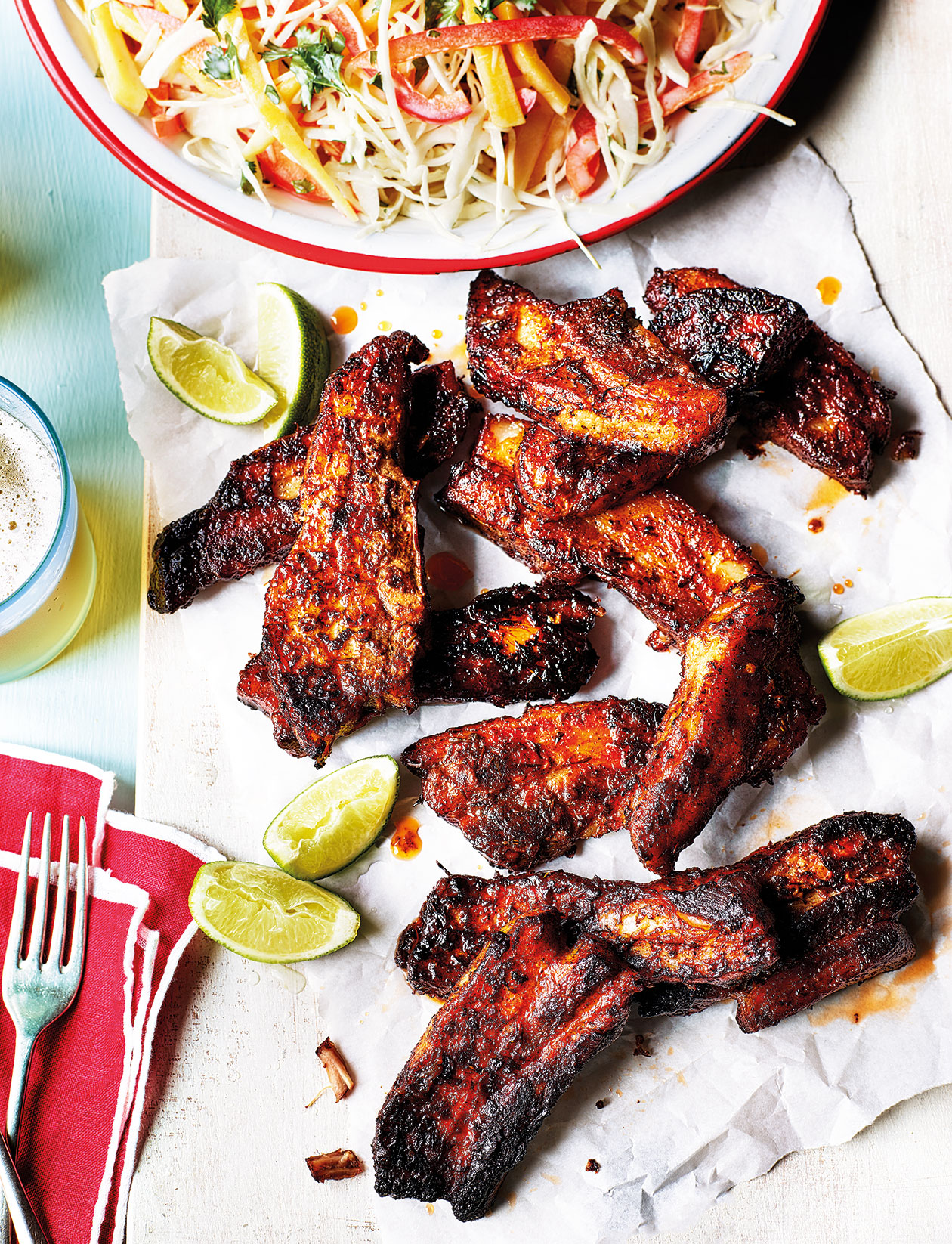 Jerk pork belly with mango slaw recipe Sainsbury`s Magazine