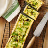 Creamy courgette and pea quiche