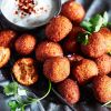 Fragrant spiced red pepper falafel with smoky yogurt dip