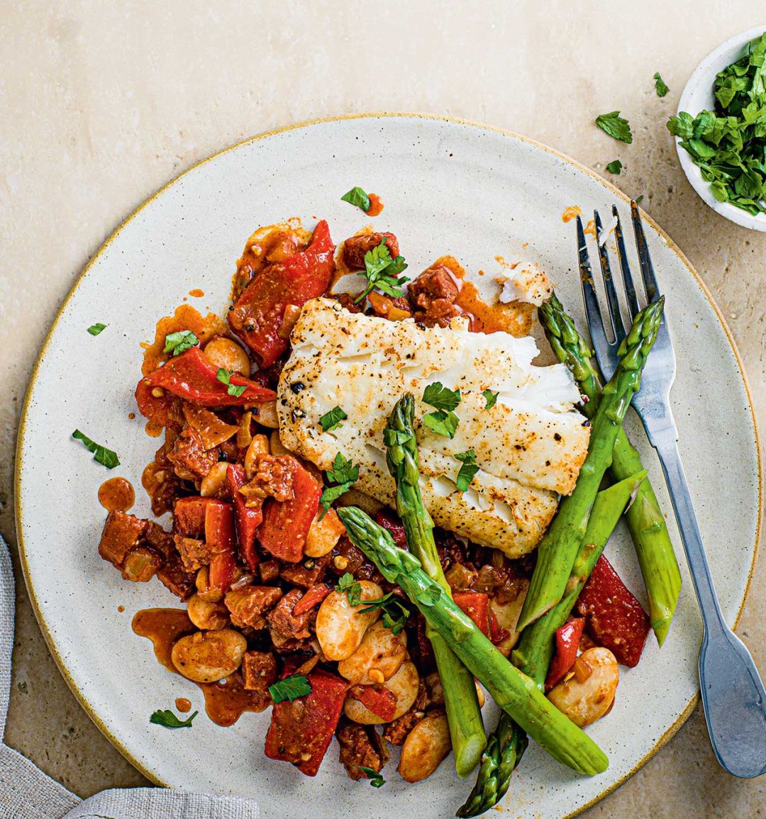 Butter bean, pepper and chorizo sauté with seared cod and asparagus