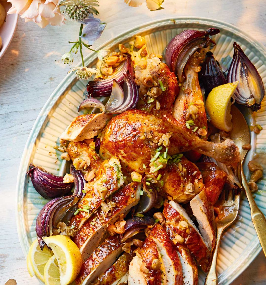 Roast chicken with herby lemon butter and hazelnut vinaigrette