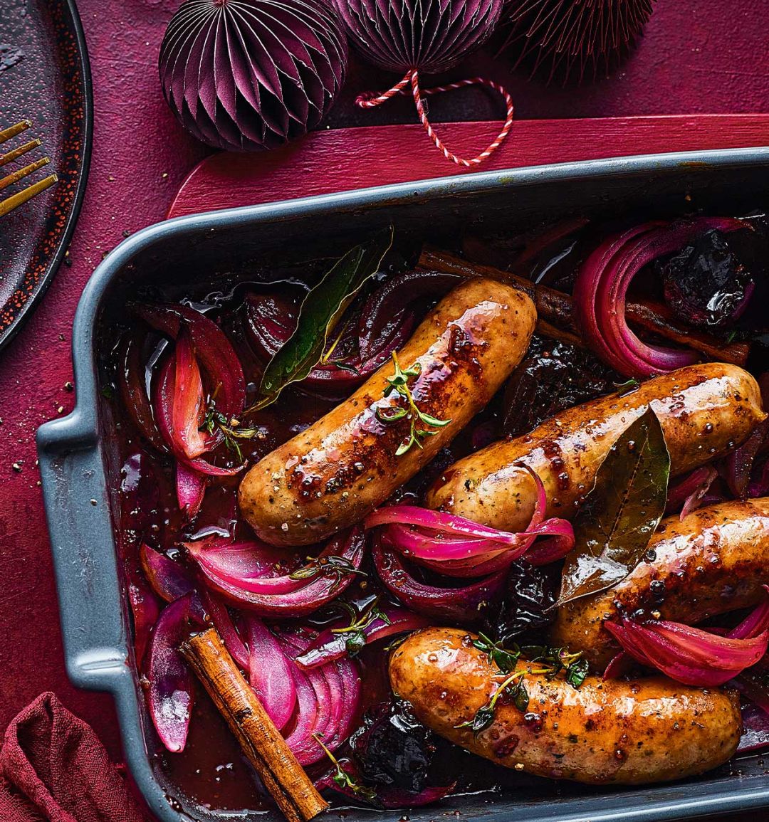 Sausage, cinnamon and prune traybake