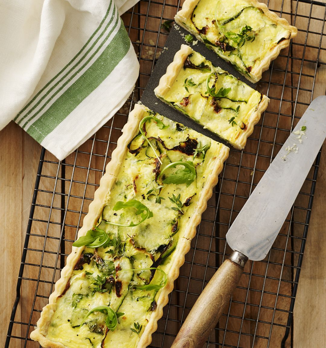Creamy courgette and pea quiche