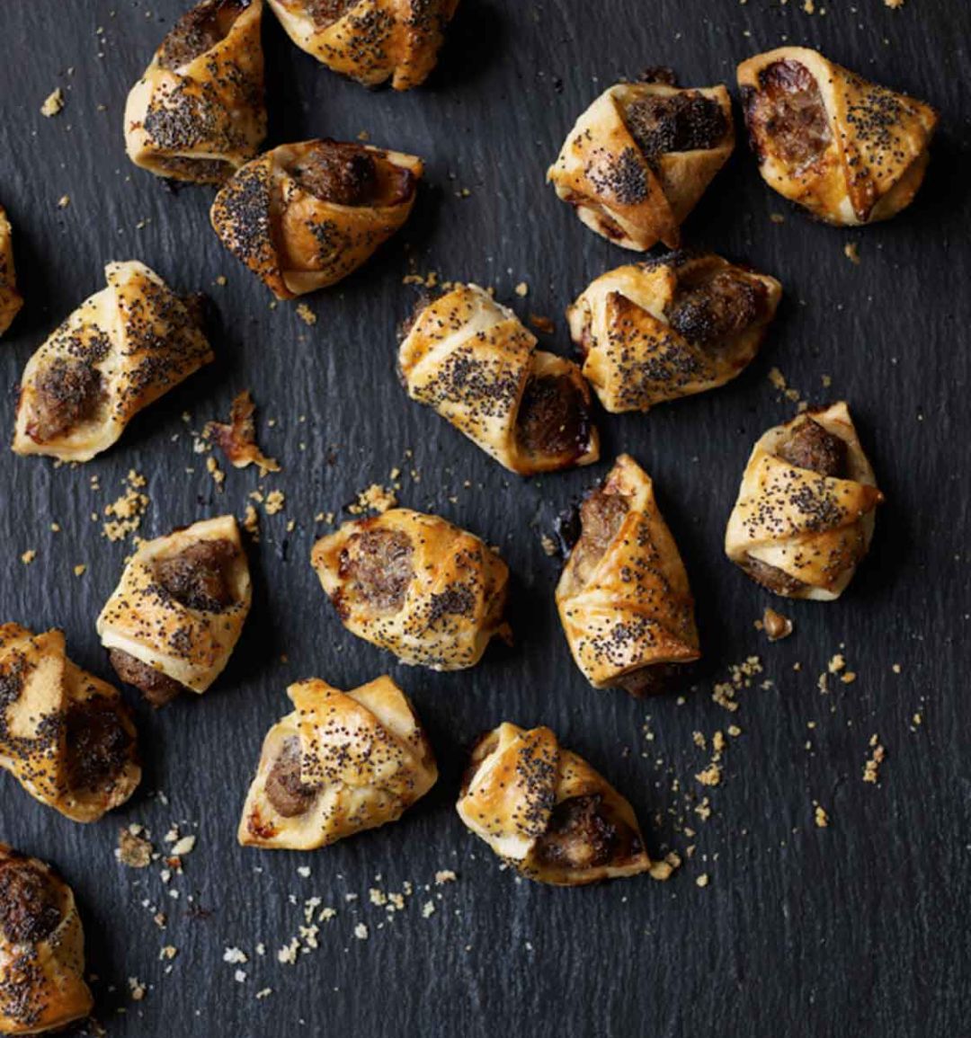 Sausage rolls with mustard and poppy seeds