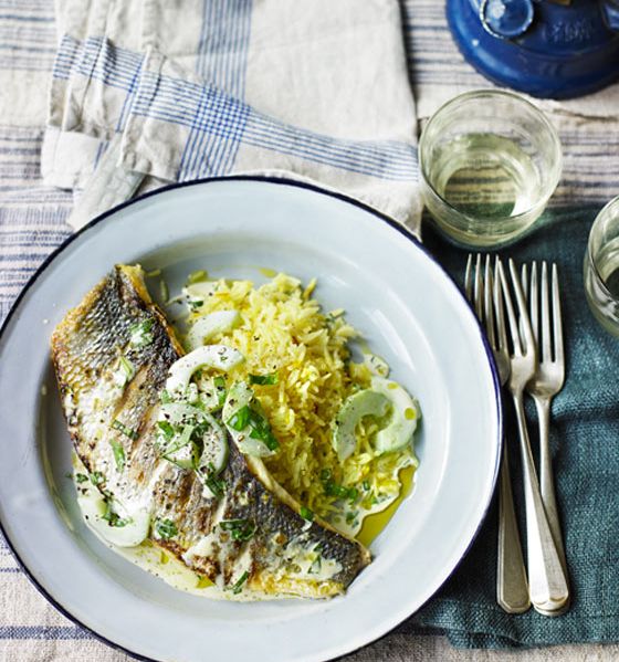 Grilled sea bass with cucumber and basil sauce and saffron pilaf